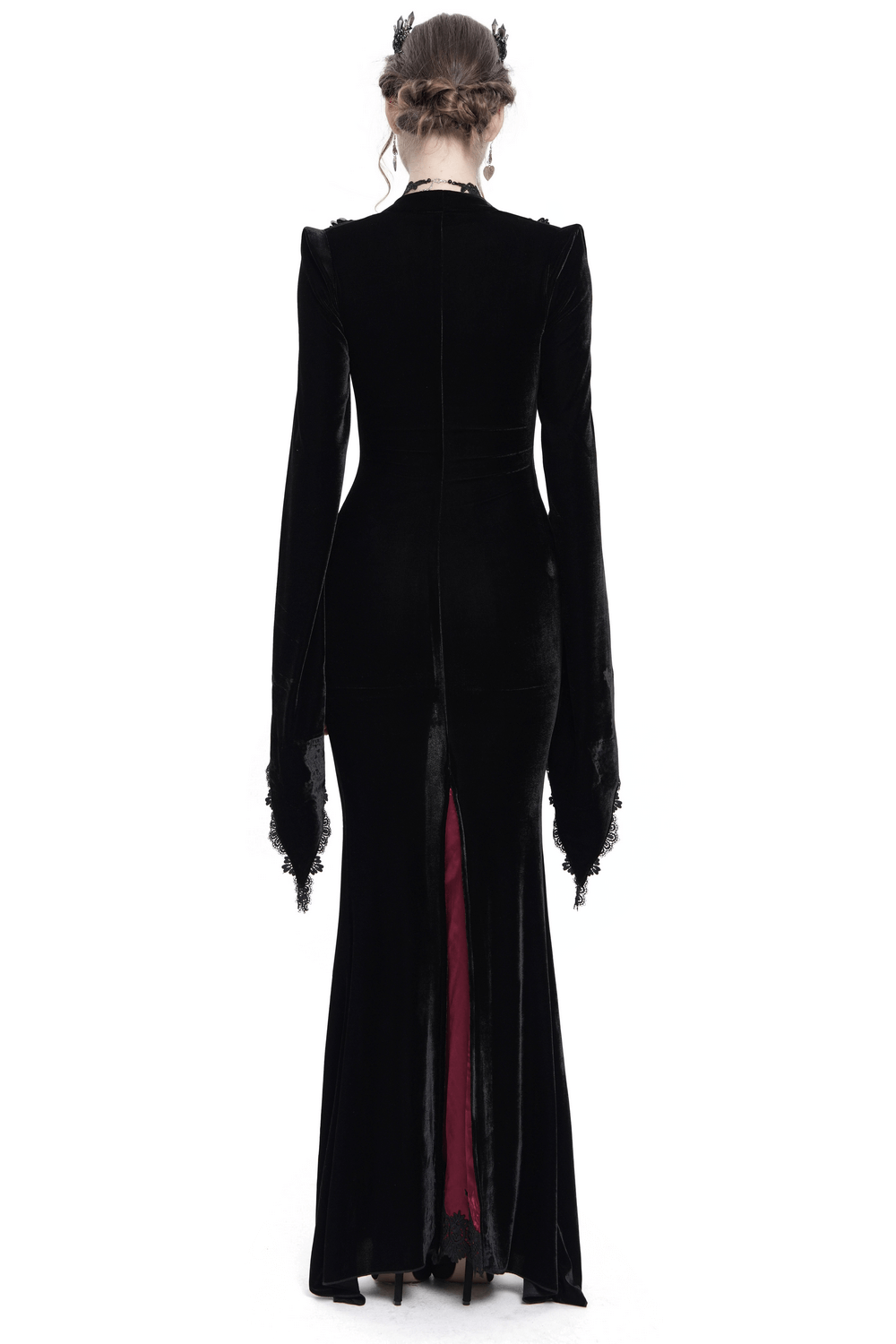Back view of a chic velvet evening dress featuring lace bell sleeves and a dramatic split with wine red accents.