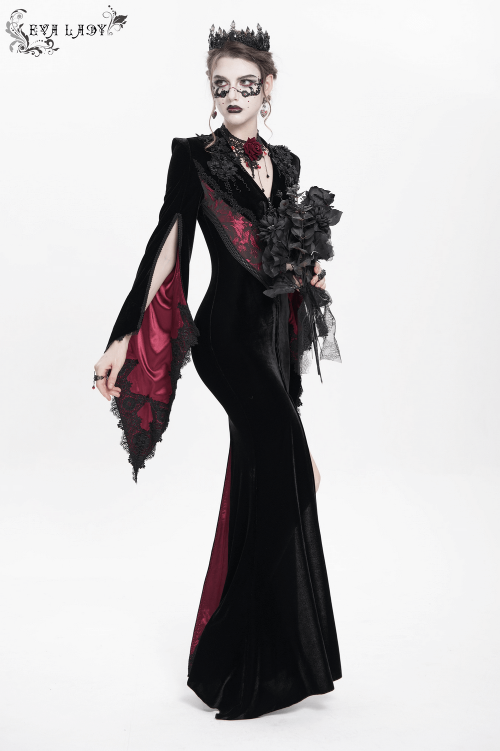Chic velvet evening dress with lace, featuring wine red accents and dramatic bell sleeves.