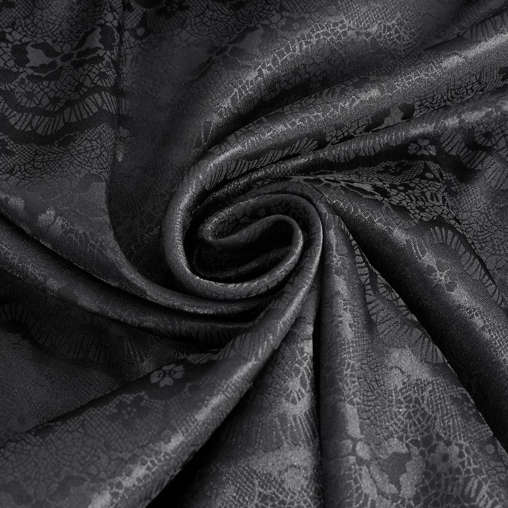 Luxurious black lace fabric with intricate patterns, perfect for chic Victorian-style clothing.