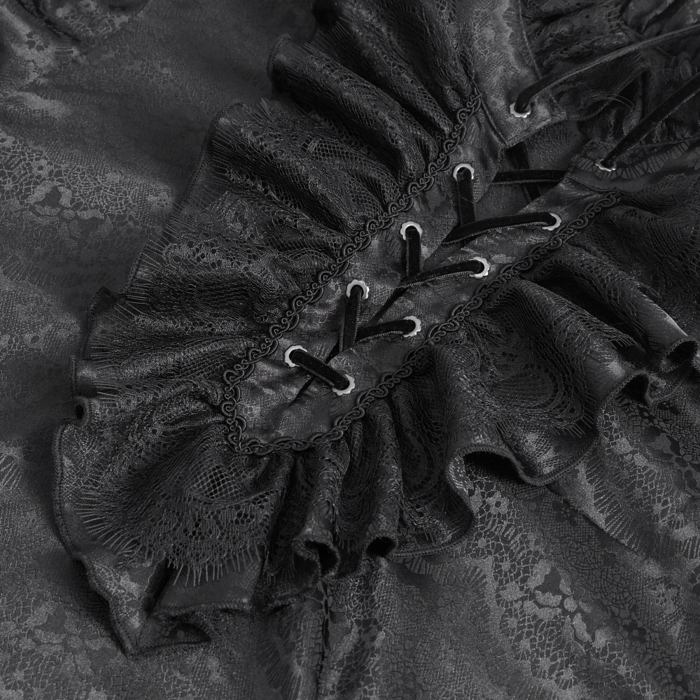 Close-up of ruffled neckline and lace detailing on a chic black lace shirt with elegant texture.