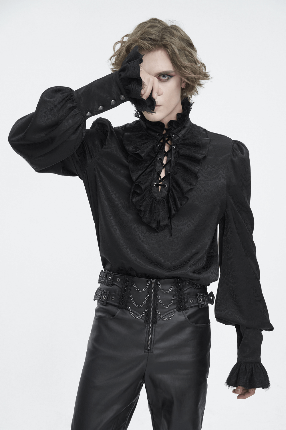 Chic Victorian black lace shirt with ruffled neckline and tassel sleeves, perfect for upscale events.