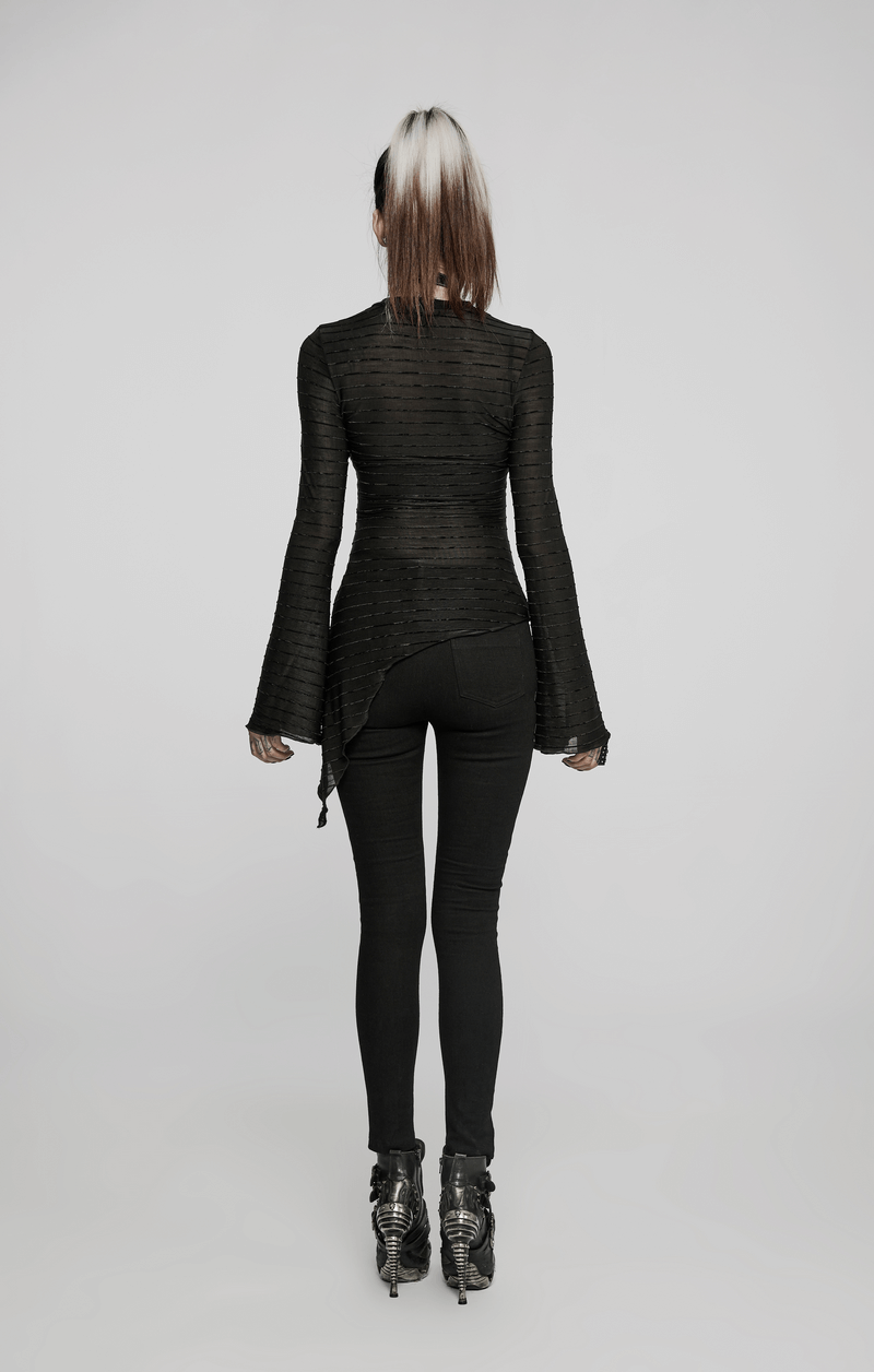 Back view of a woman wearing Gothic lace-up skinny jeans with a stylish black top, showcasing a rebellious punk look.