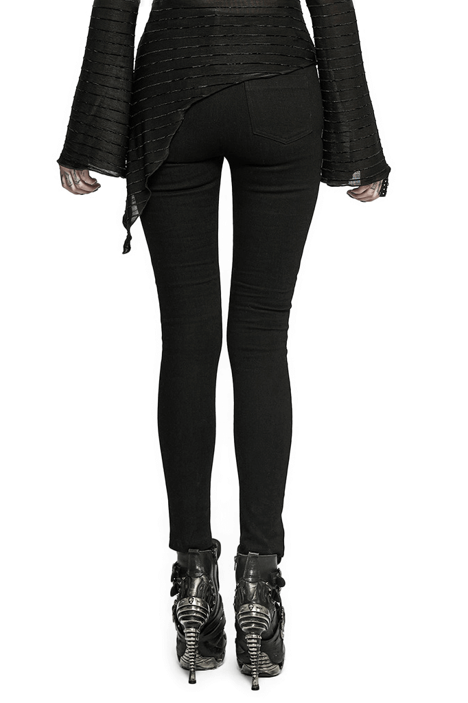 Chic women's Gothic lace-up skinny jeans showcased from the back, paired with stylish punk-themed footwear.