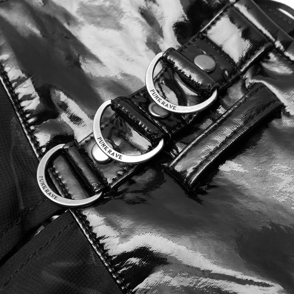 Close-up of shiny black adjustable belt with metallic buckles for punk style half skirt.