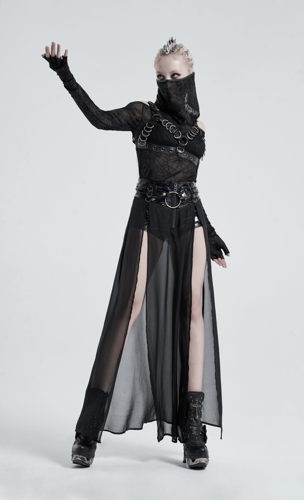 Punk fashion model showcasing a chiffon layered half skirt with adjustable belt and edgy accessories.