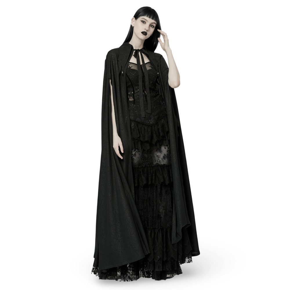Woman wearing a stunning chiffon printed goth lapel cloak with crystal pendant and lace details.