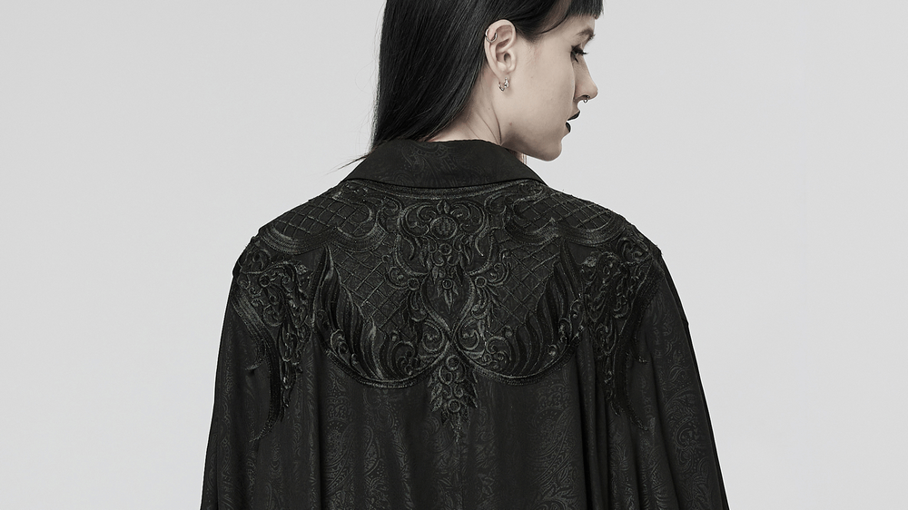 Elegant back view of a black chiffon goth cloak with ornate lace detailing and a sophisticated lapel design.