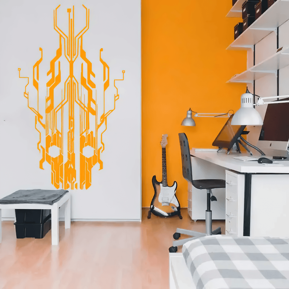 Chip Circuit Skull Vinyl Decal for Office and Gaming Rooms on a vibrant orange wall in a modern workspace.