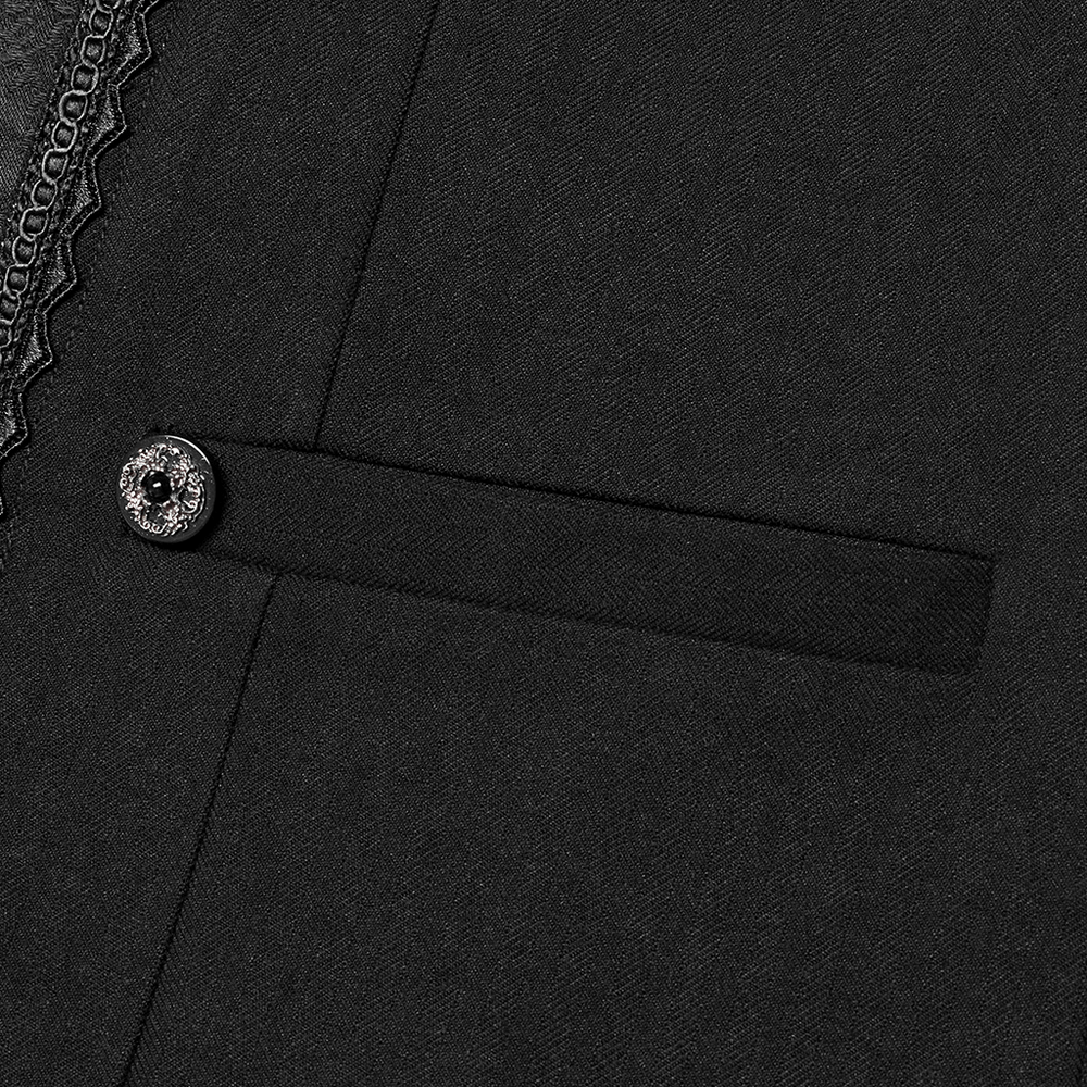 Close-up of black Gothic vest showcasing intricate lace trim and a decorative hand-sewn button.