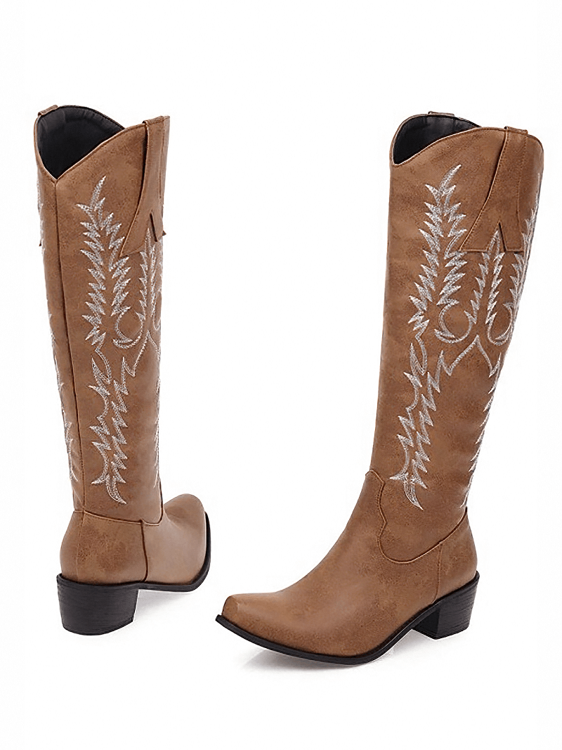 Classic knee-high cowboy boots with mid heels and stylish embroidery in brown color.