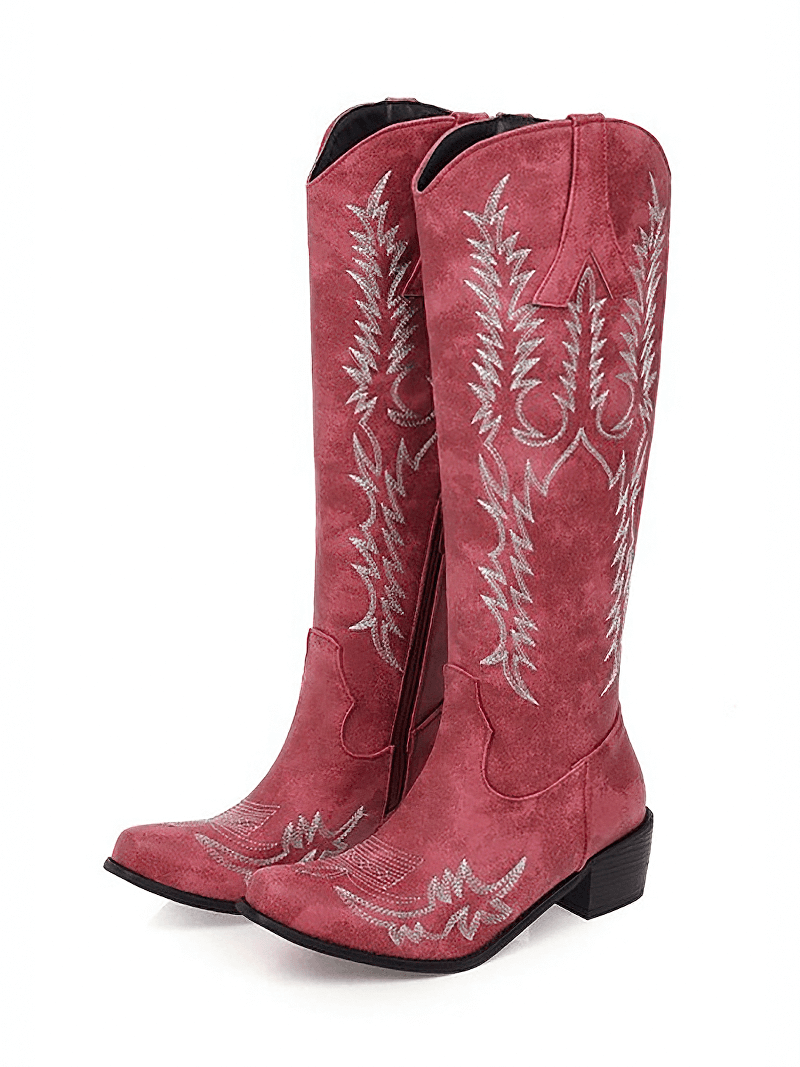 Classic pink knee-high cowboy boots with mid heels and intricate silver embroidery details.
