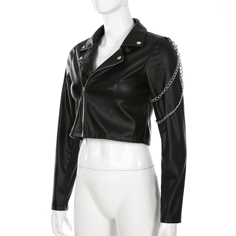 Black short faux leather motorcycle jacket for women with chains and a turn-down collar.