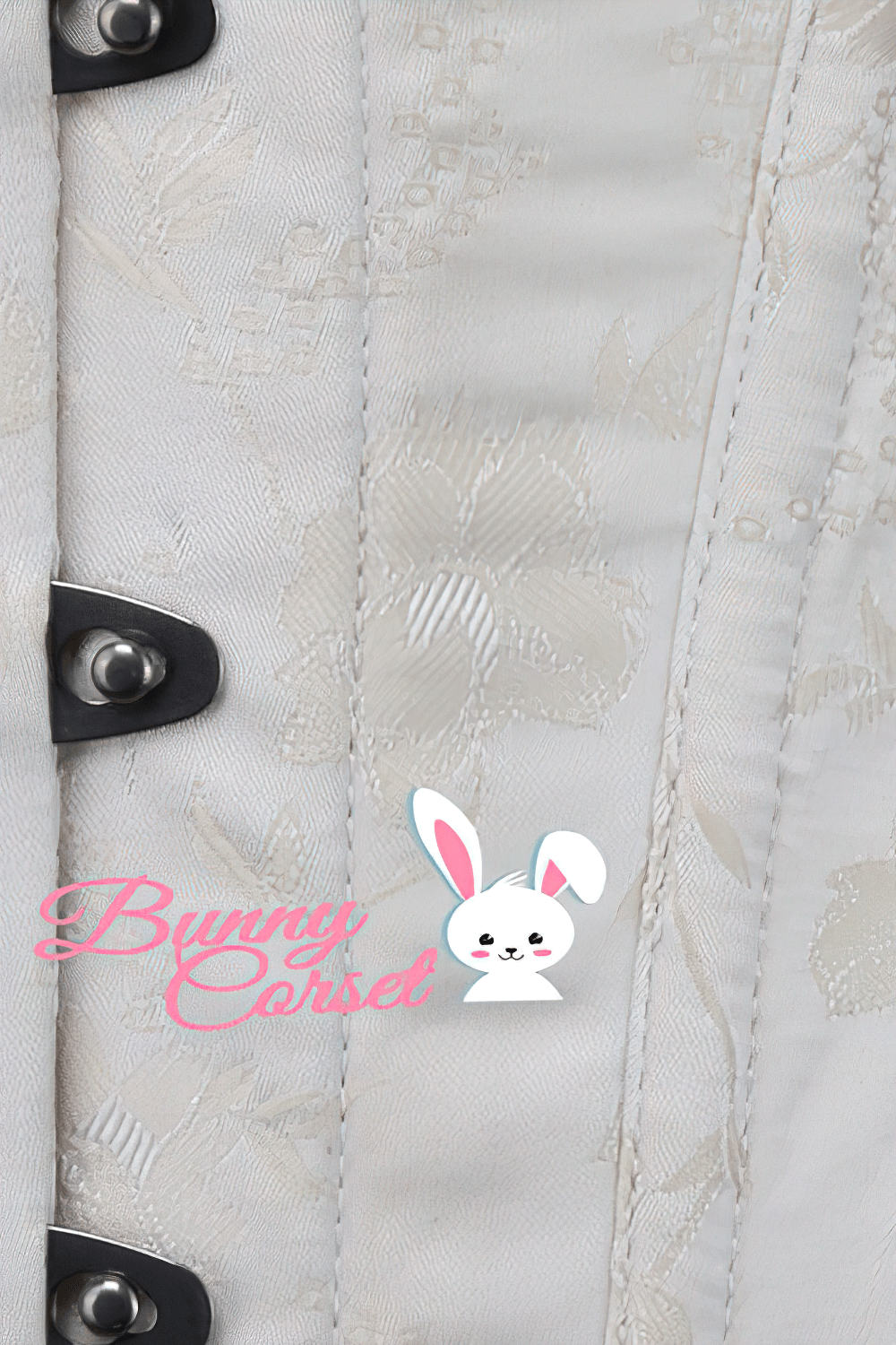 Close-up of cold shoulder lace corset with steel boning and floral texture, featuring Bunny Corset logo.