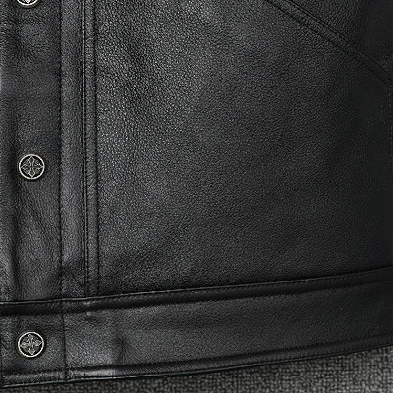 Close-up of a black genuine leather vest with snaps, highlighting its biker style and texture.