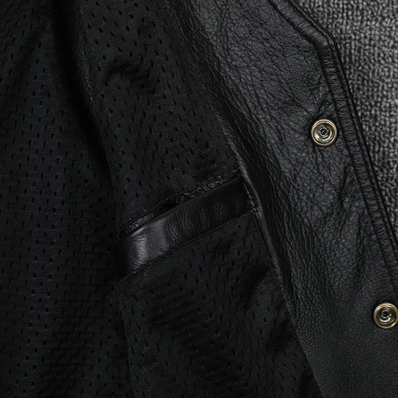 Interior view of a collarless men's black genuine leather vest with snap buttons and stylish texture.