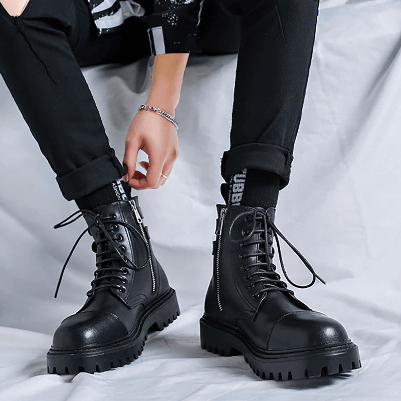 Men's black lace-up ankle boots with a sturdy rubber sole, perfect for casual wear and stylish comfort.