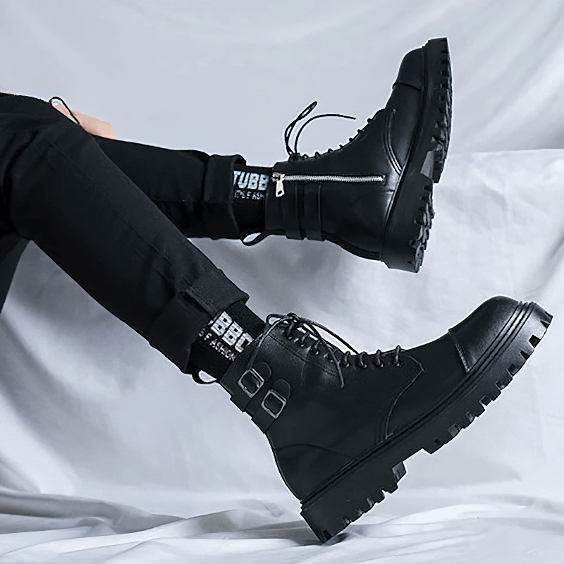 Men's black lace-up ankle boots with stylish belts, perfect for casual wear and comfort.