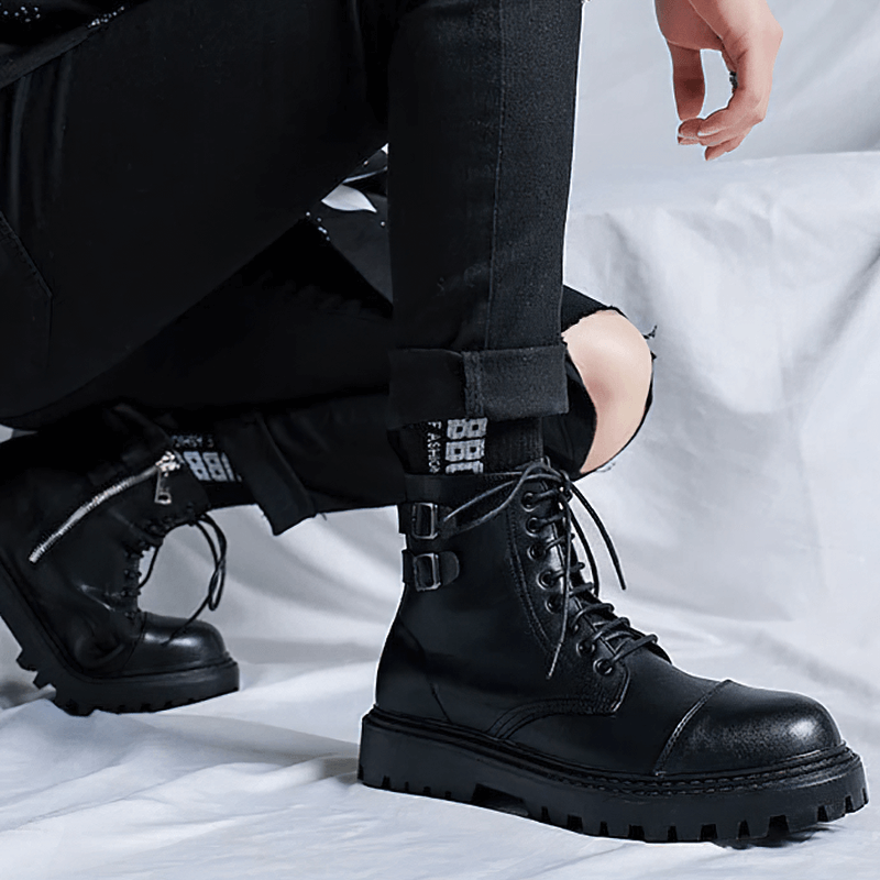Men's black lace-up ankle boots with stylish belts and rubber sole, perfect for casual wear.
