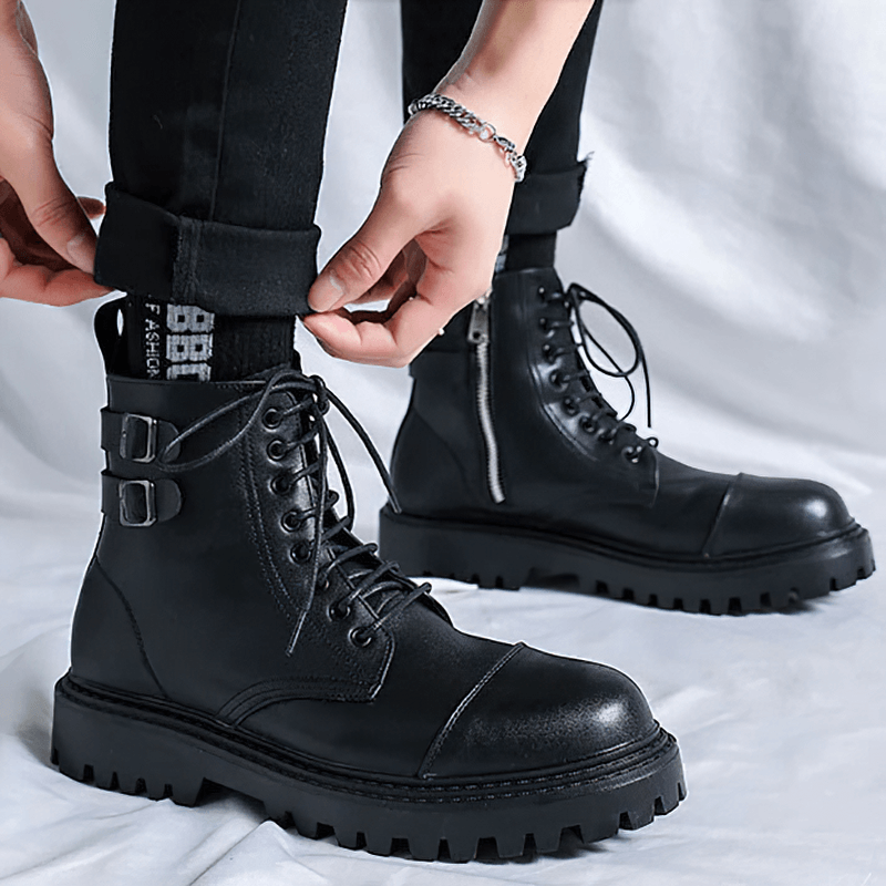 Men's black lace-up ankle boots with buckles and rubber sole, perfect for casual style and comfort.