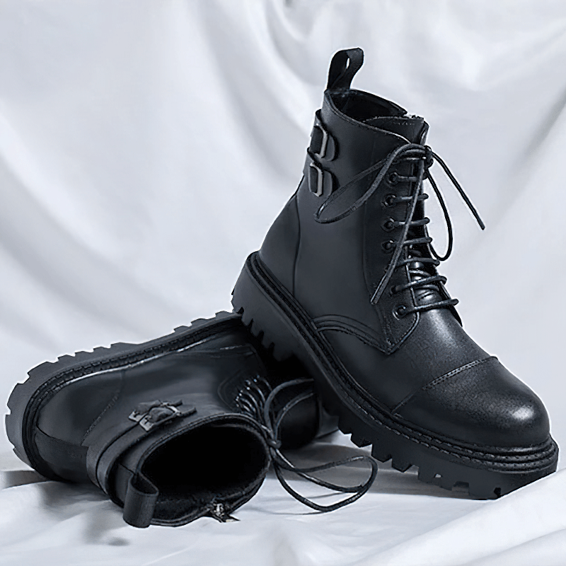 Men's black lace-up ankle boots with rubber sole and stylish decor, perfect for casual wear.