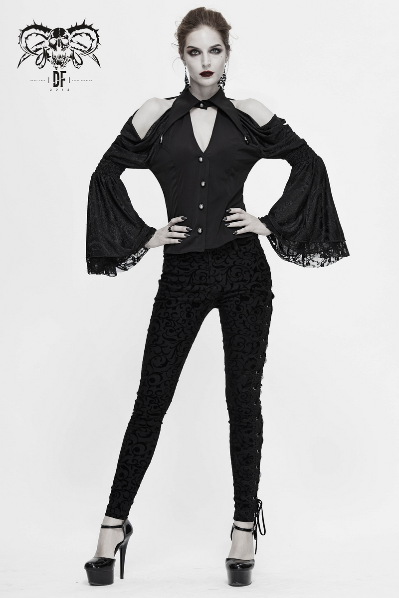 Gothic women's black leggings with lacing, paired with a stylish black blouse and heels for a striking look.