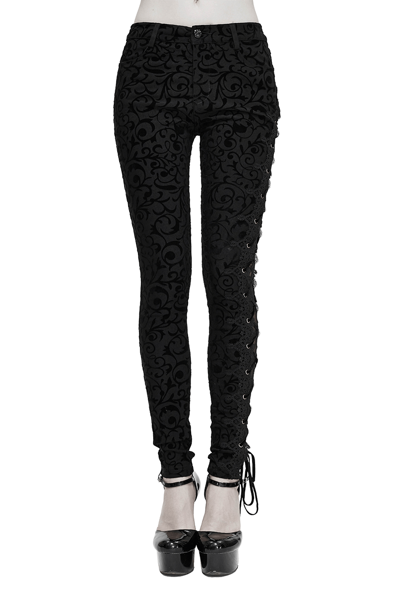 Black gothic leggings with side lacing, featuring a stylish ornate design and form-fitting cut.
