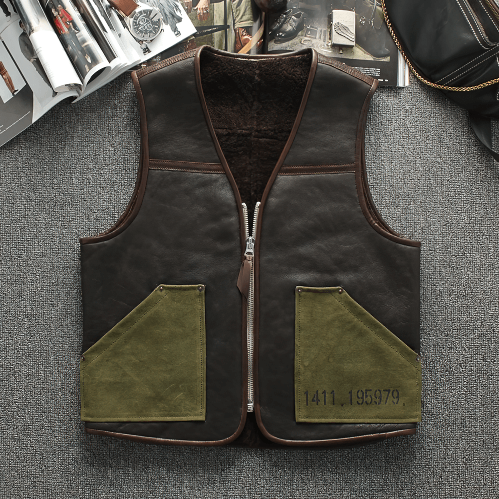Men's black leather biker vest with green pockets, vintage style, perfect for motorcycle enthusiasts.