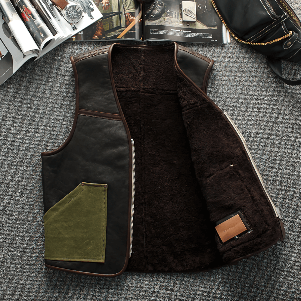 Black leather biker vest with green pockets, showcasing a vintage design for men, perfect for stylish riders.