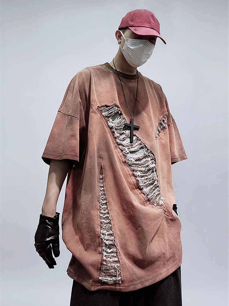 Trendy men's oversized vintage cotton T-shirt with distressed hole-ripped details, perfect for a stylish, edgy look.