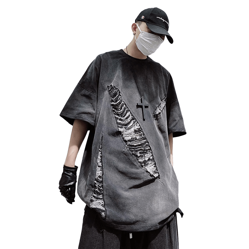 Cool oversized vintage hole-ripped T-shirt for men with edgy distressed design and relaxed fit.