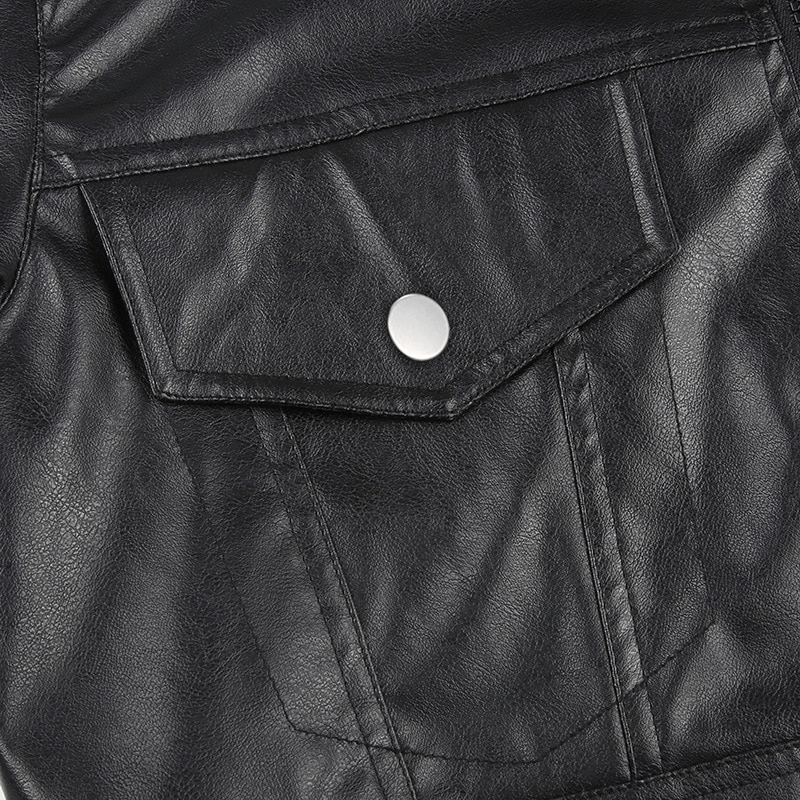 Close-up of the edgy turn-down collar on a black cropped PU leather jacket showcasing its stylish pocket detail.