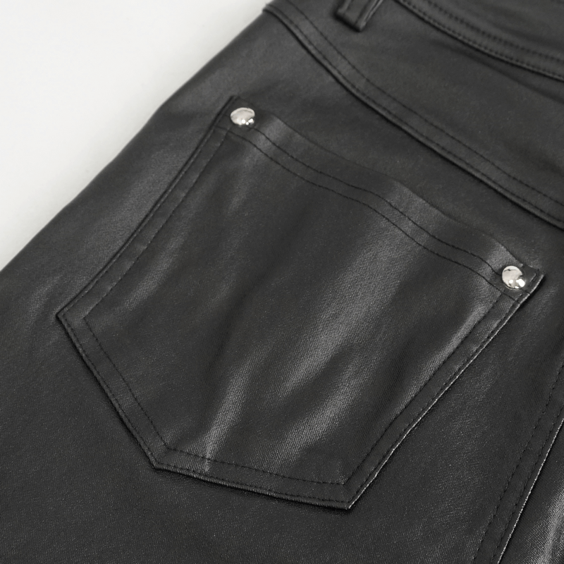 Close-up of the back pocket of cool women's black punk style multi-buckle splice pants with shiny finish.