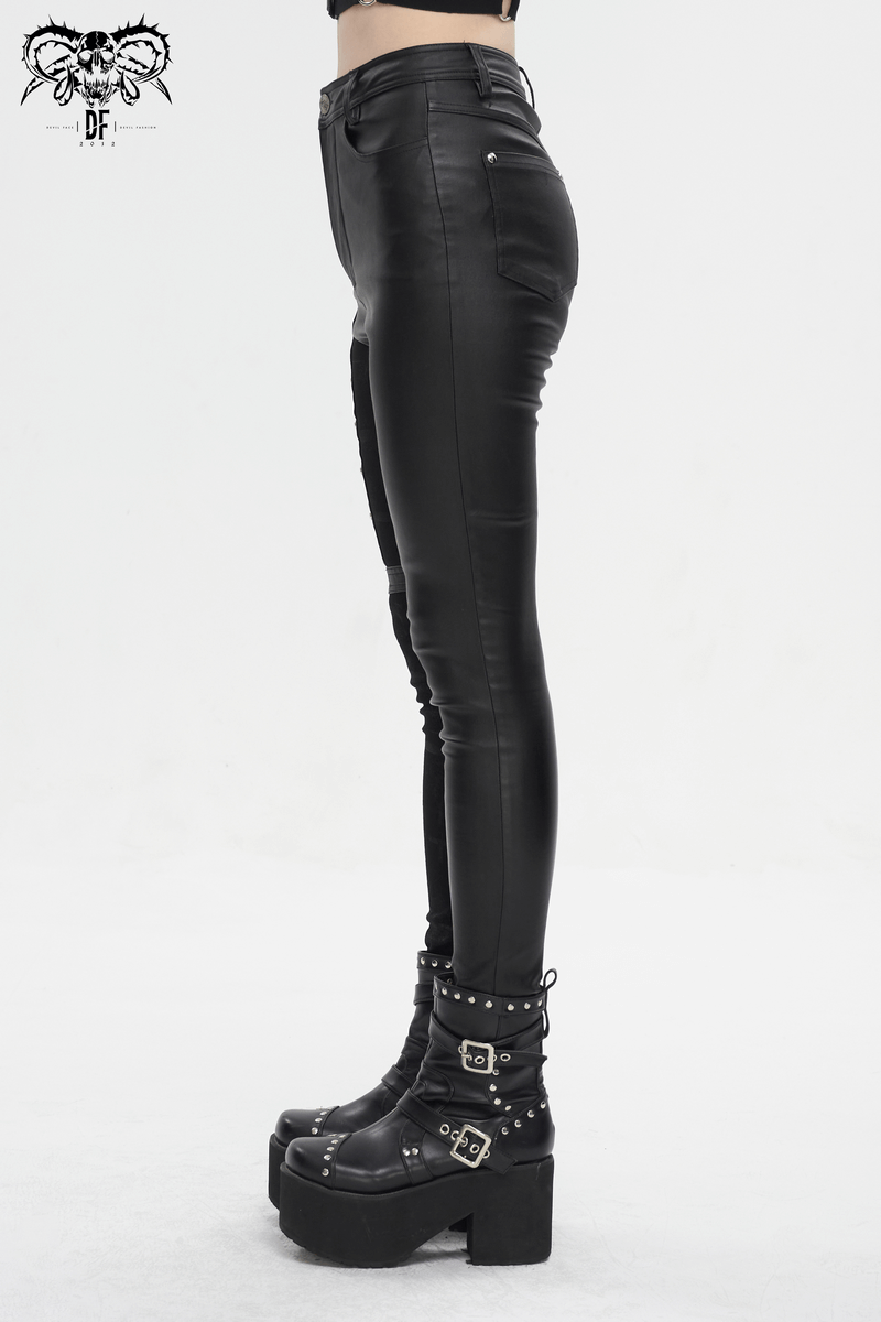 Side view of women's edgy black multi-buckle splice pants with stylish platform boots, perfect for punk fashion.