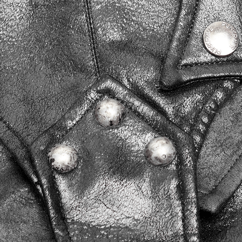 Close-up of crack skin stitched punk hood showcasing metallic buttons and patch detail for an edgy look.