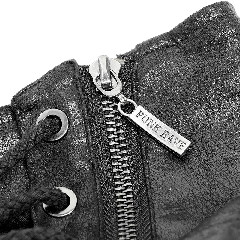 Close-up of a punk rave boot zipper featuring a metal tag, showcasing edgy fashion details.