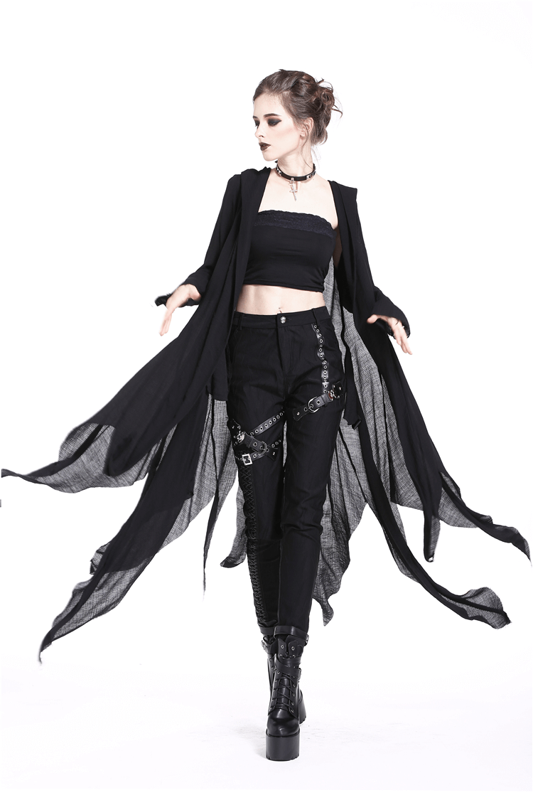Gothic punk model in black crescent moon shredded long hoodie trench coat and edgy outfit, showcasing dramatic style.