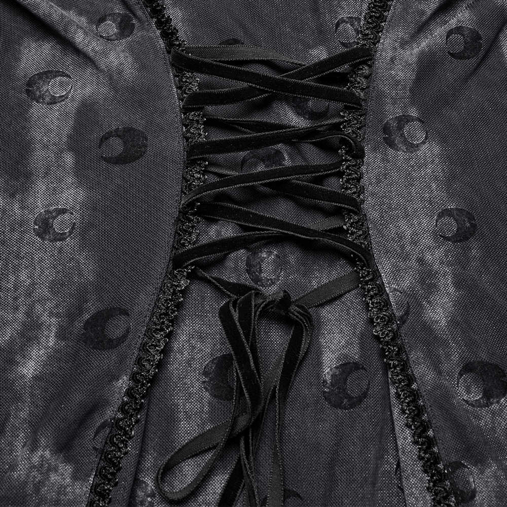 Close-up of crescent print dress showing gothic lace-up detail and moon pattern on soft mesh fabric.