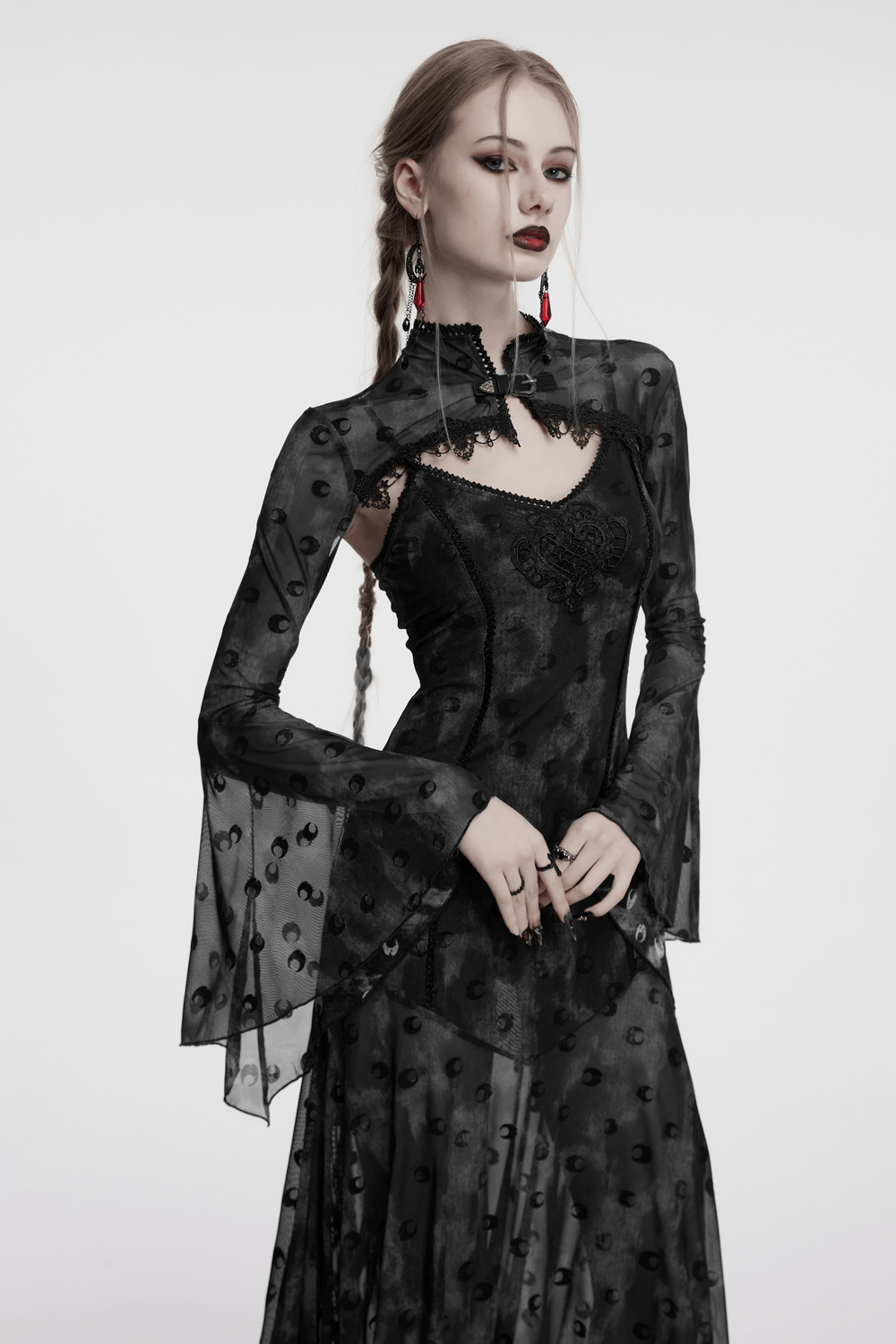 Gothic mesh moon print dress featuring lace details and bell sleeves for a dreamy, ethereal look.