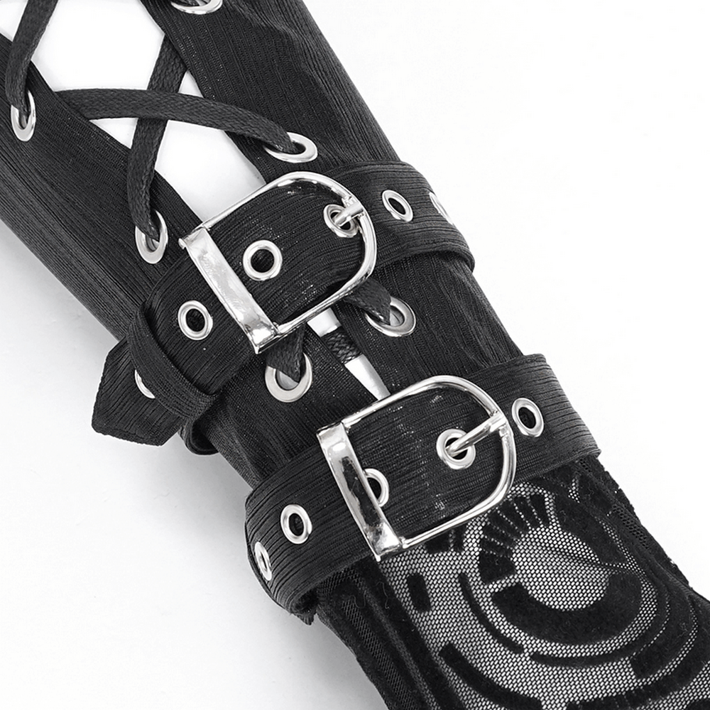 Close-up of black Cyberpunk arm gauntlet with silver buckle straps and intricate circuit pattern.
