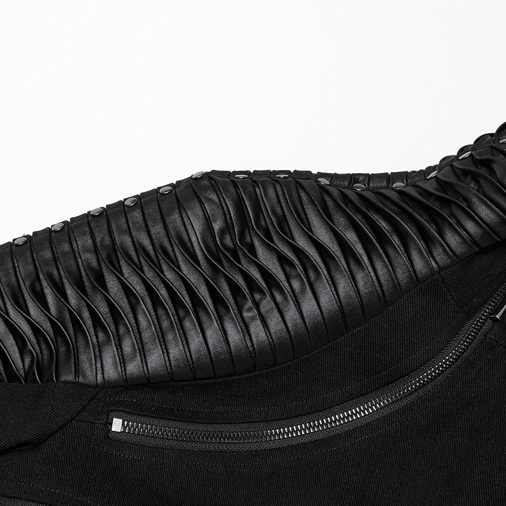 Detail of cyberpunk black cropped jacket showcasing sleek zippers and textured mesh design.
