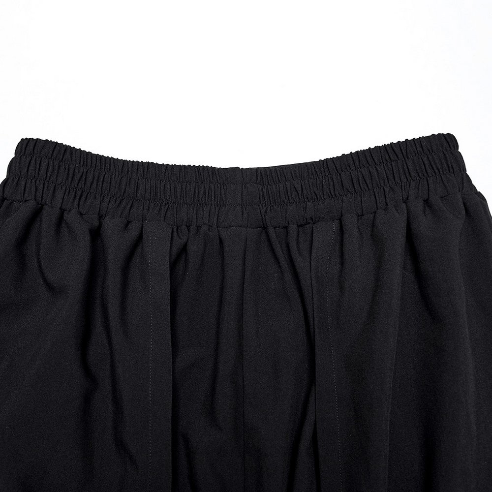 Close-up of the elastic waistband on cyberpunk black wide-leg pants, showcasing comfort and edgy style.