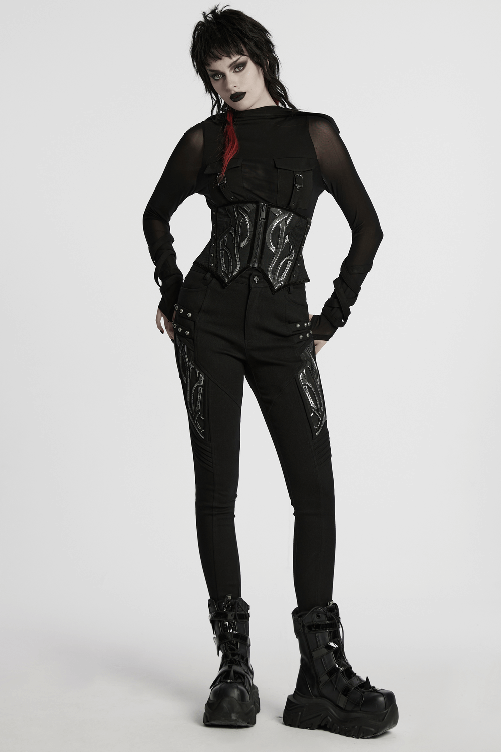Futuristic black mesh corset belt with rubber panels, layered in an edgy cyberpunk outfit.