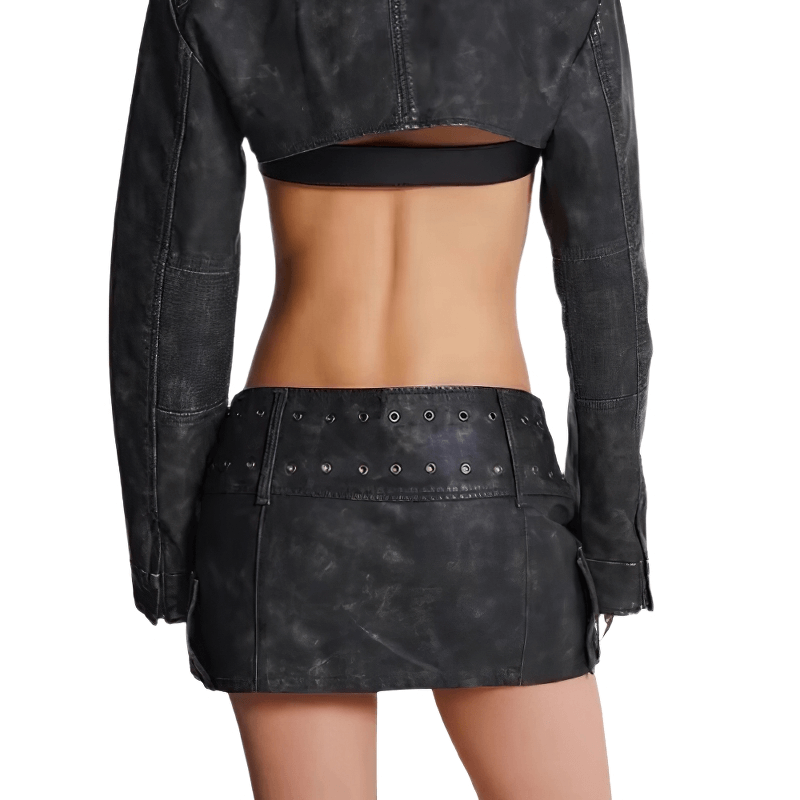 Back view of a woman wearing a cyberpunk cross-belt leather mini skirt with edgy detailing.