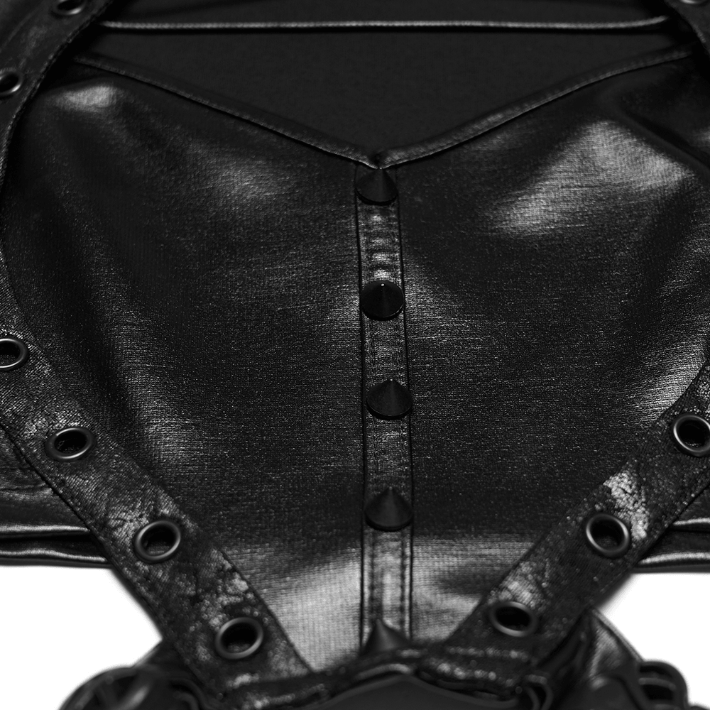 Alt Tag: Cyberpunk Faux Leather Lace Up Harness Crop Top close-up black faux leather bust panel with snaps, grommets, and gothic cutout detail