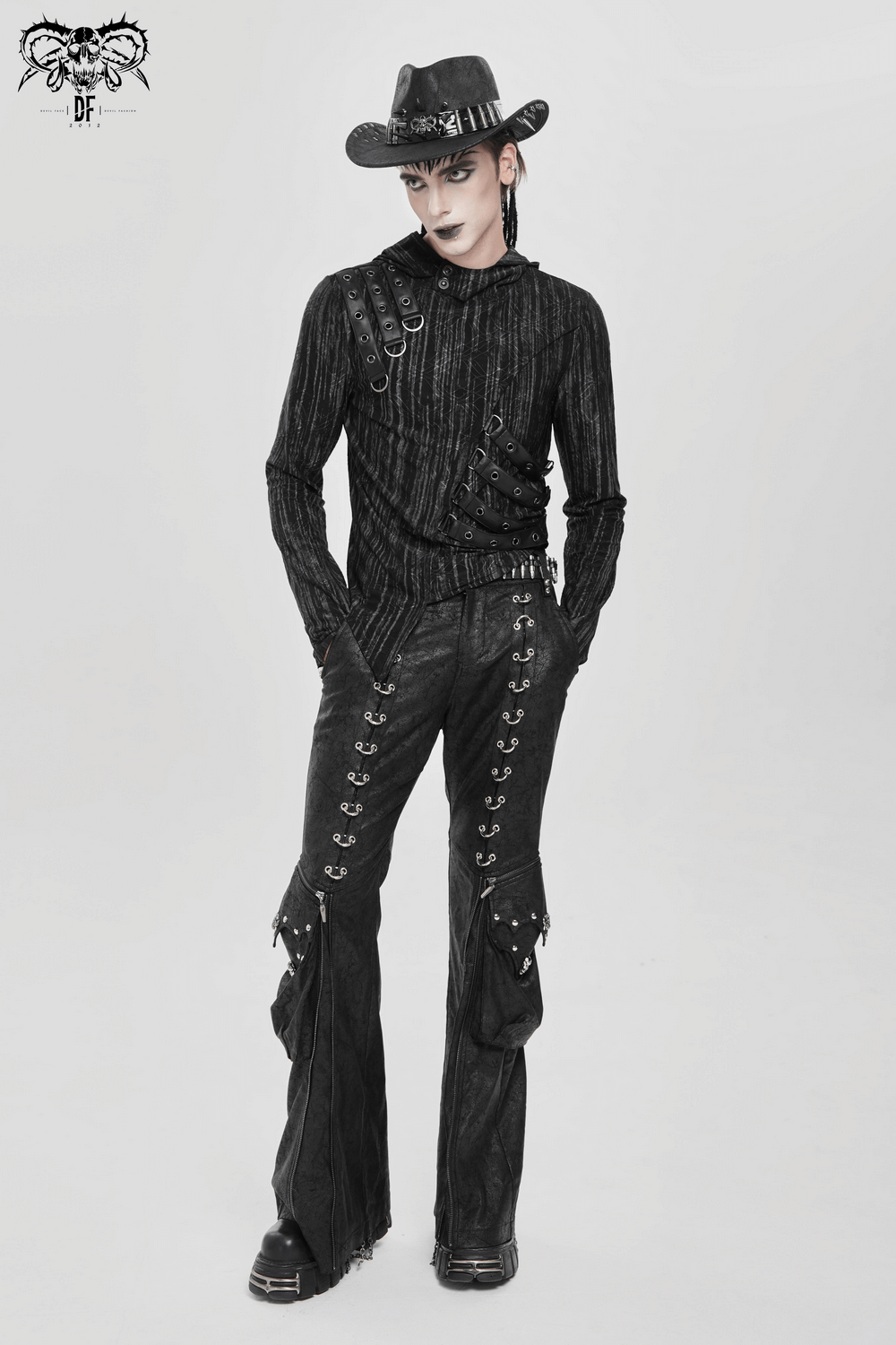 Cyberpunk Hooded Top with Straps and Asymmetric Hem showcased with punk style pants and a cowboy hat.