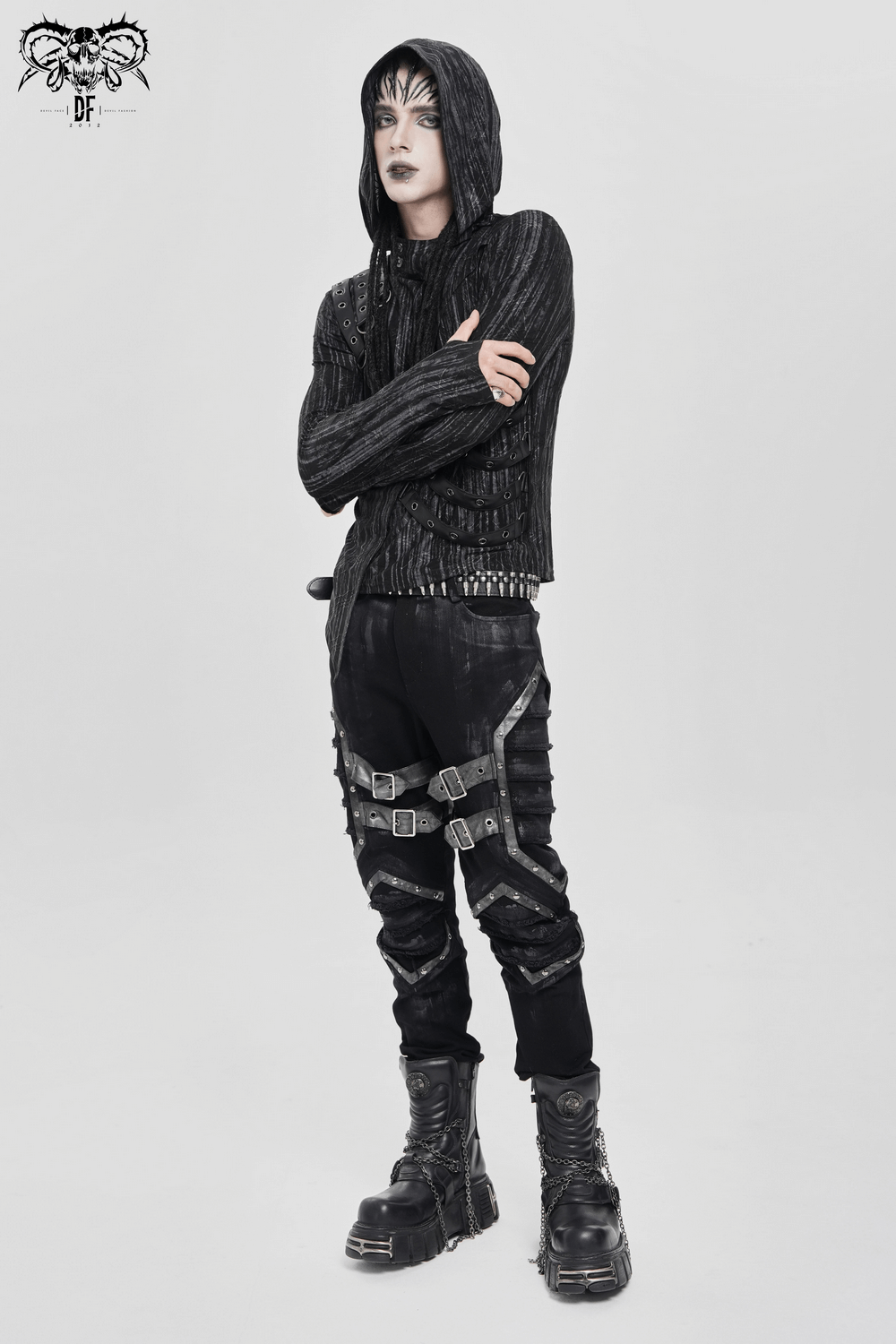 Cyberpunk Hooded Top with Straps and Asymmetric Hem styled with goth streetwear pants and chunky boots.
