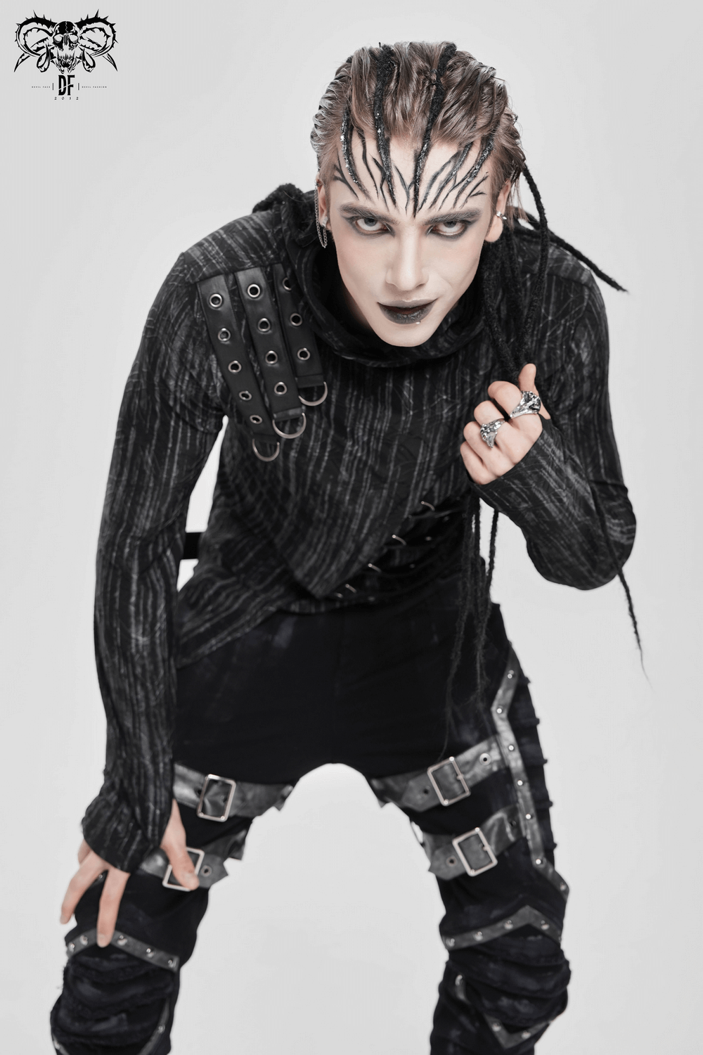 Cyberpunk Hooded Top with Straps and Asymmetric Hem worn by a model showcasing gothic streetwear style with edgy details.