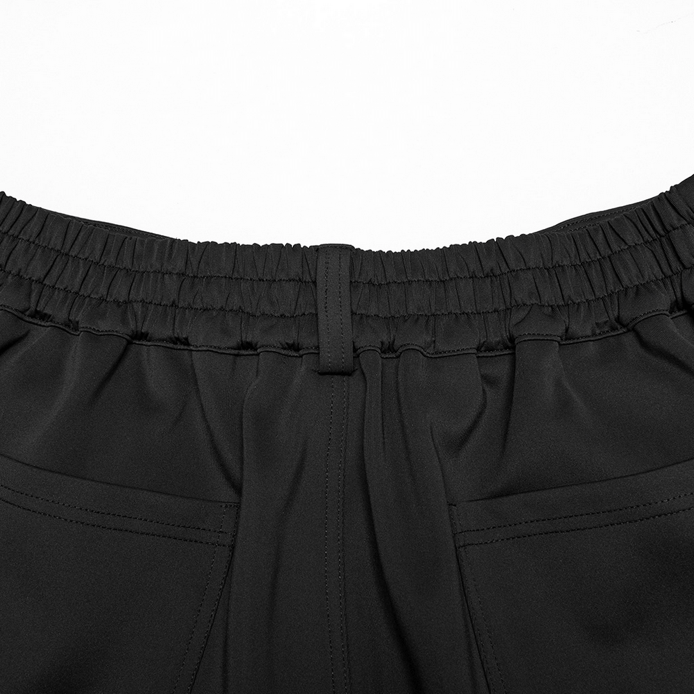 close-up of the waistband and back pockets of black cyberpunk knitted pants with elastic detailing