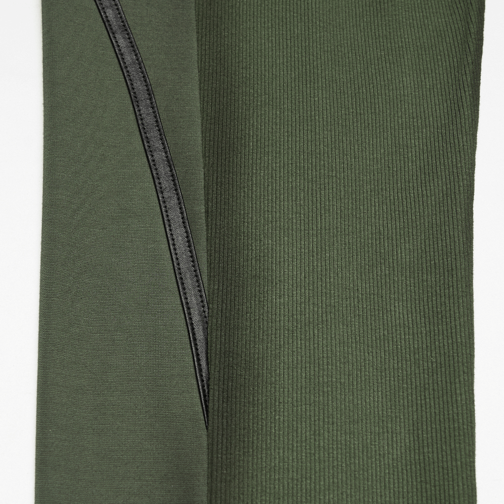 Close-up of Army Green Cyberpunk Leggings with Futuristic Panel Design showcasing the sleek black accents.