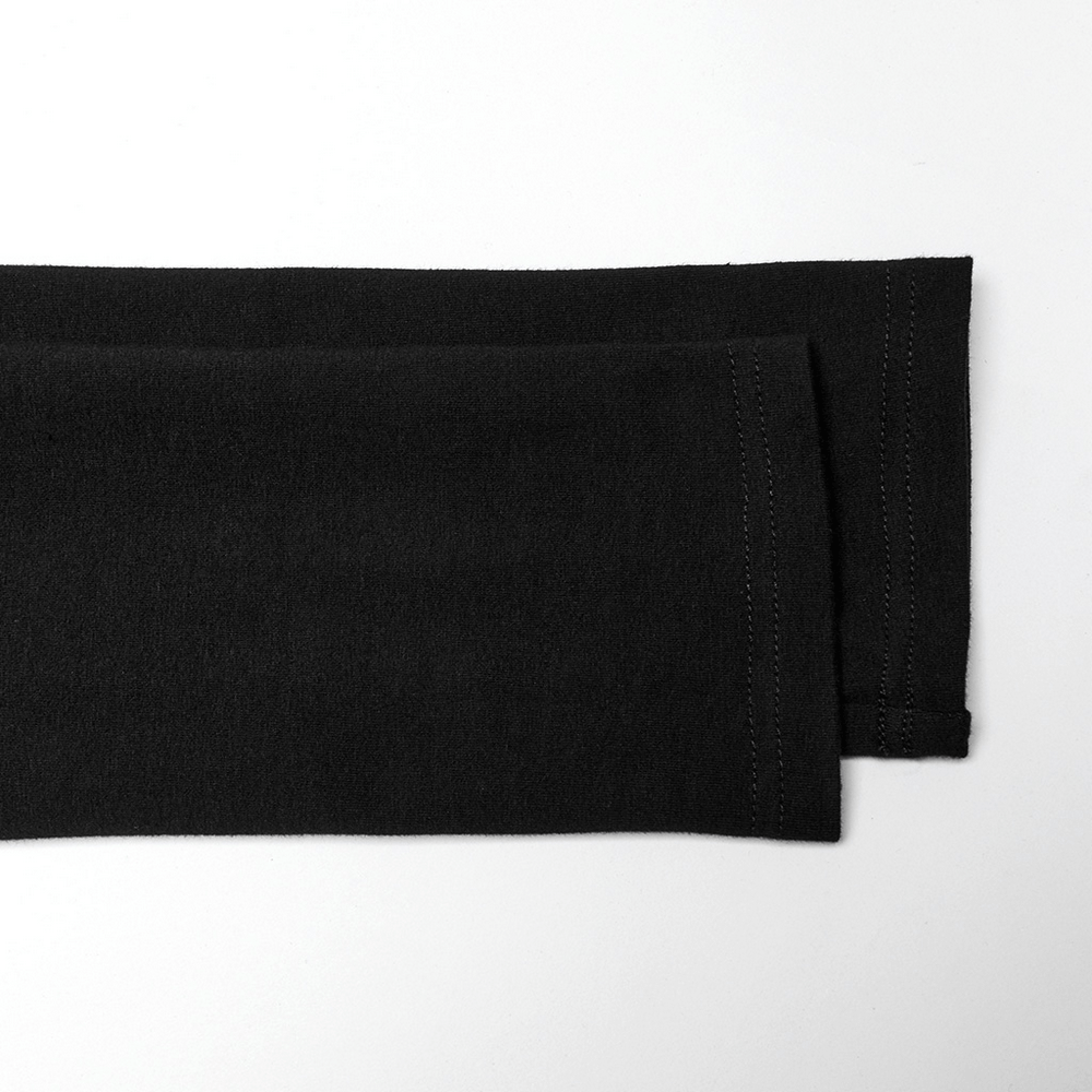 Close-up of the black sleeves of a tactical men's top showcasing the sleek fabric and clean stitching details.